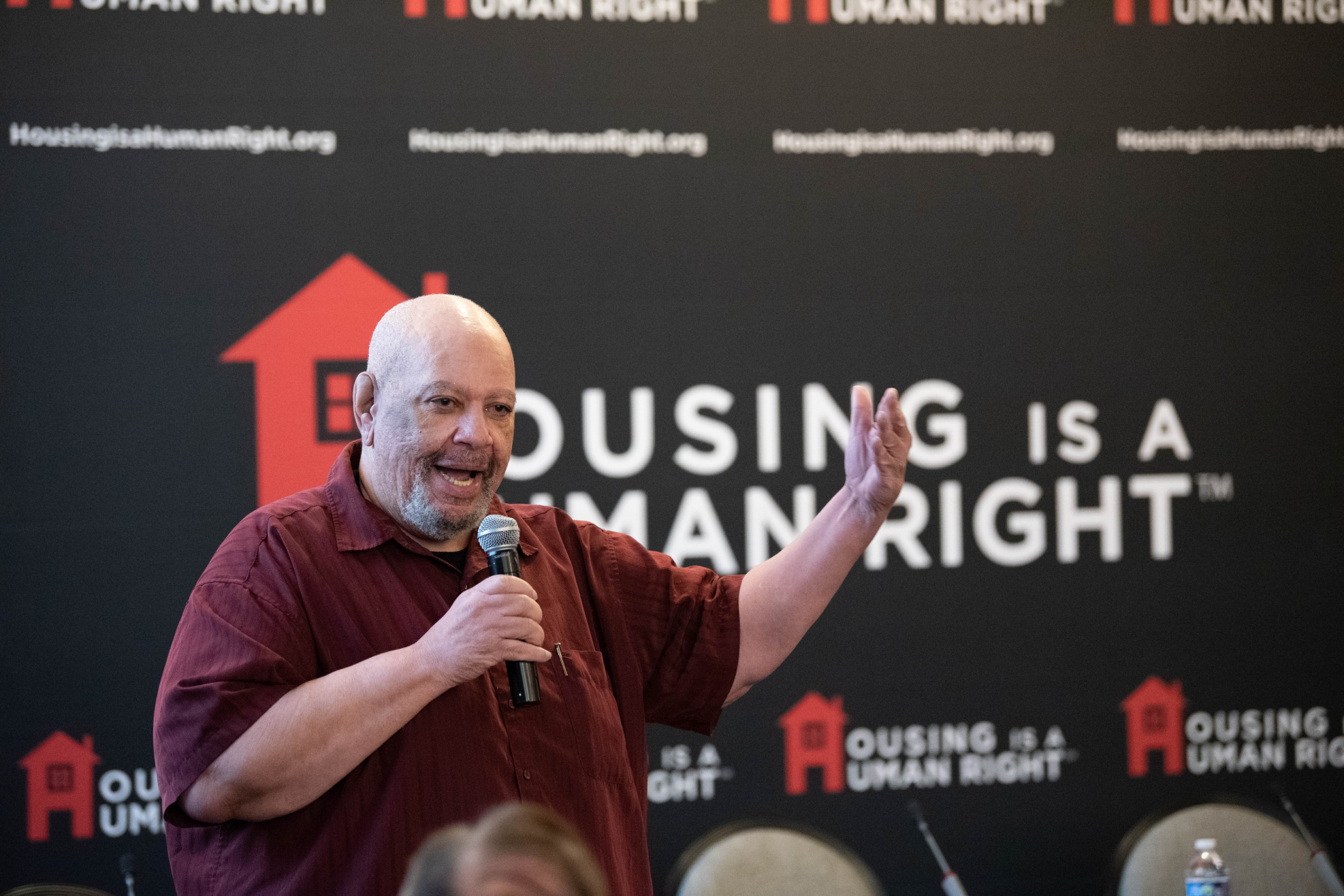 speaker at a housing is a human right conference